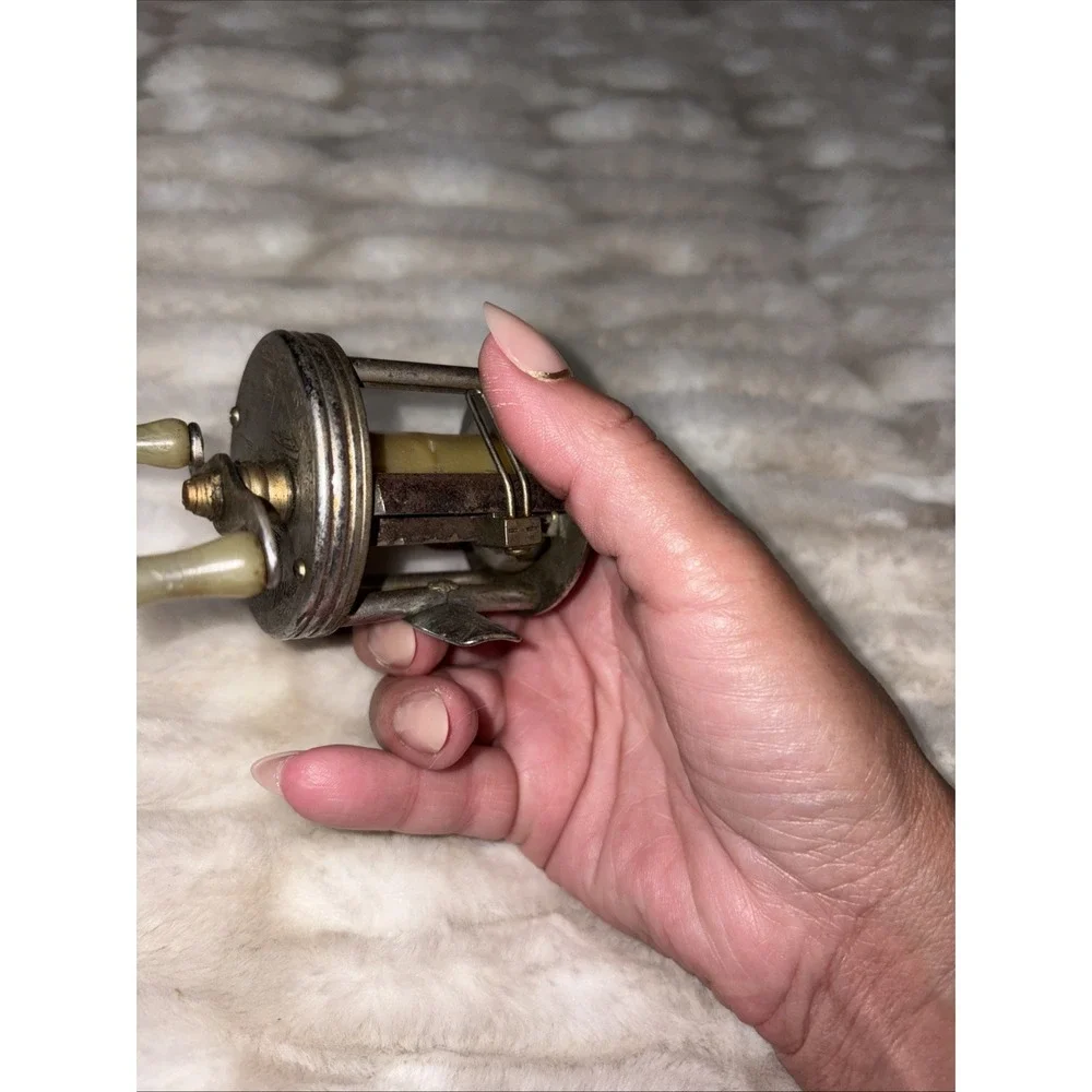 Vintage J.C. Higgins Fishing Reel Engraved Fisherman Fish Baitcaster 312.3184